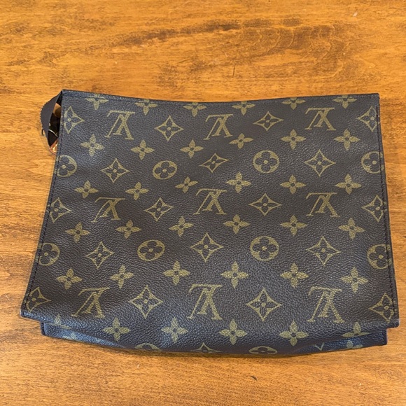 Authentic Louis Vuitton monogram leather lined zipper pouch